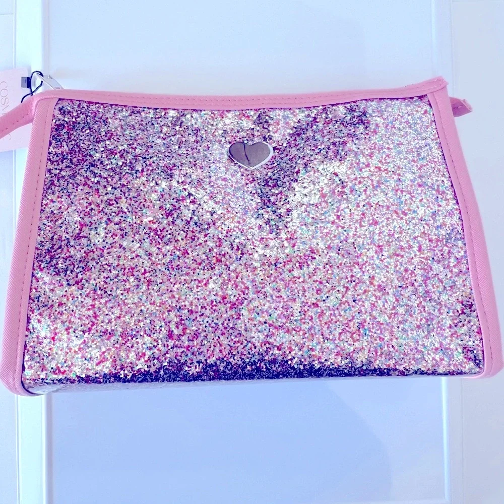 Pink Glitter Cosmetic Bag with a Silver Heart on Clear Vinyl & a Silver Zipper.